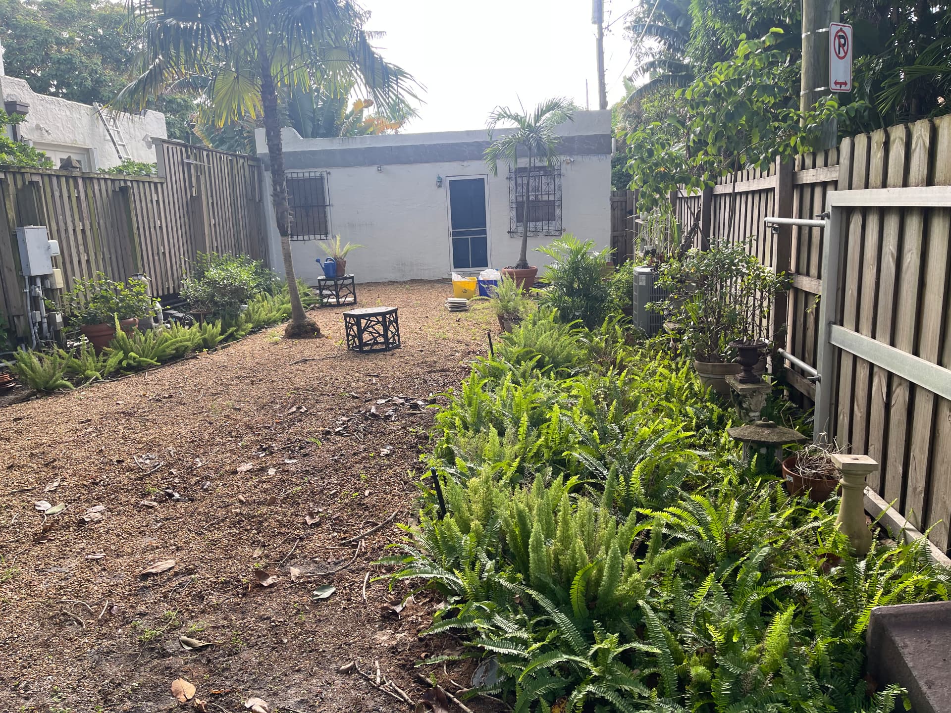 Before and after junk removal: construction debris and landscape fabric cleared from a gravel path by All Out Rubbish (after)
